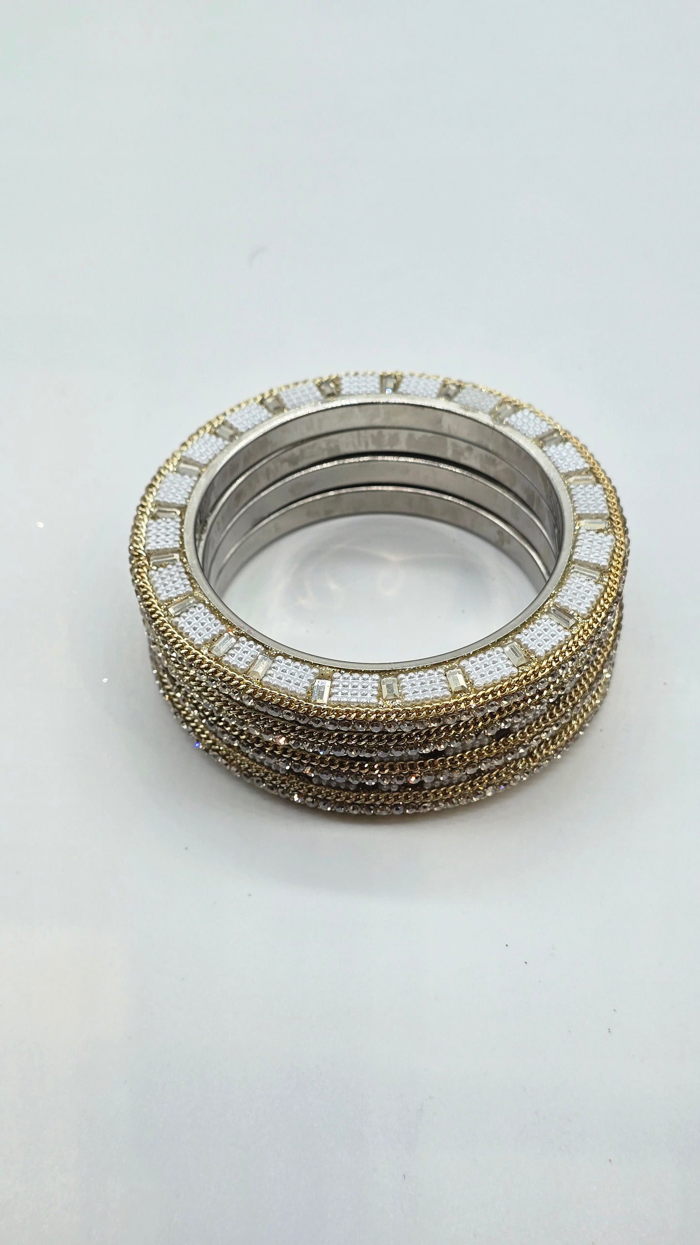 Pearl Glow Pacheli – Elegant Metal Bangles Set (4 Pieces)