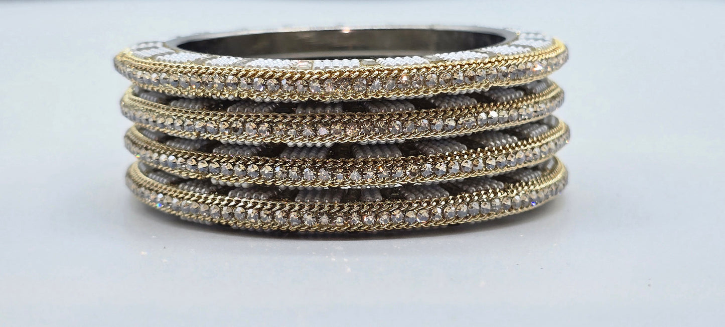 Pearl Glow Pacheli – Elegant Metal Bangles Set (4 Pieces)